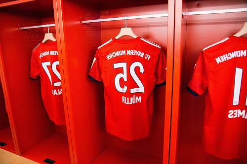indoors three orange jerseys room